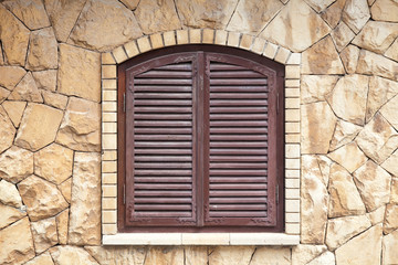 Fototapeta na wymiar wooden windows with shutters