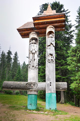 Statue of a man and a woman in the Carpathian Mountains