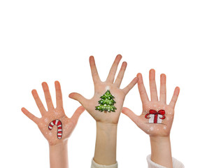 Christmas symbols painted on kid's hands. Santa, snowman, Christmas tree, present box, reindeer etc