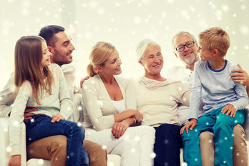 happy family sitting on couch at home