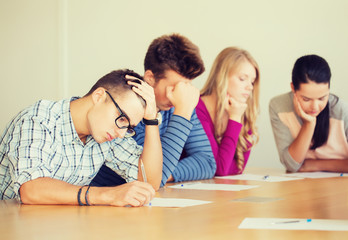 group of students with papers