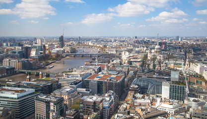 LONDON, UK - SEPTEMBER 17, 2015: City of London aerial view, Westminster side of city and bridges. London panorama form 32 floor of Walkie-Talkie building