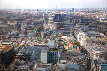 LONDON, UK - SEPTEMBER 17, 2015: City of London aerial view, office buildings and streets. London panorama form 32 floor of Walkie-Talkie building