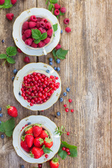 fresh raspberry , red currant and strawberry