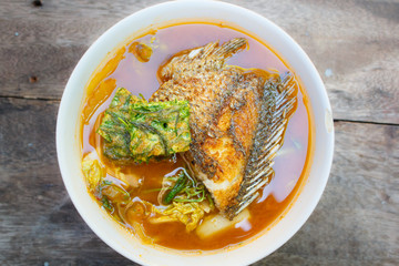 Spicy and soup curry with fish and vegetable omelet.
