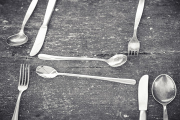 vintage silverware on an old table