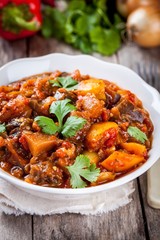 Stewed vegetables in a white bowl