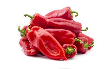 Bunch of fresh sweet red peppers isolated on white background