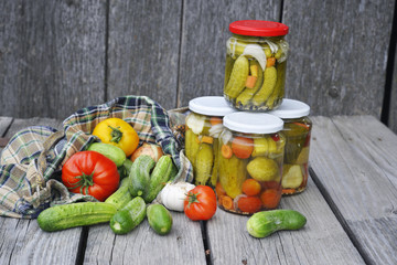 jars with pickled cucumbers