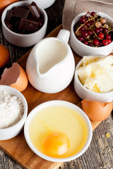 prepared baking ingredients on wooden table