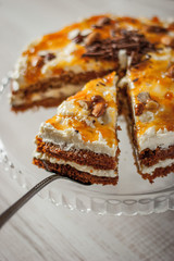 Carrot cake with almonds and chocolate chips vertical