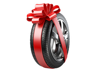 tyre with a wrapped red ribbon and bow. © Oleksandr