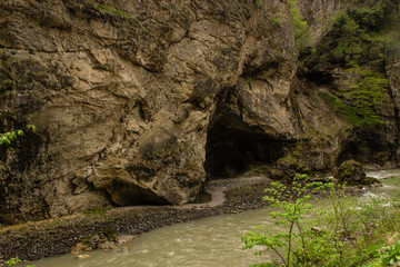 Mountain river and grotto