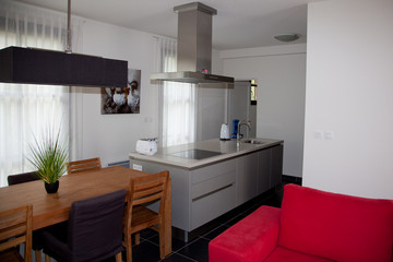 Close up details of luxurious modern fitted kitchen in home.