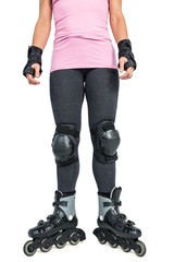 Low section of sporty woman inline skating