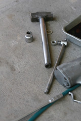 Pile maintenance tool in a car repair.