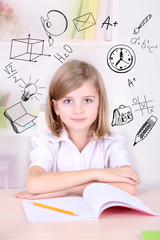 Little schoolgirl  with school  icons