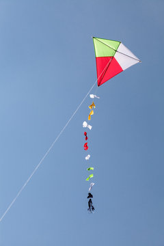colorful kite flying in a beautiful blue sky