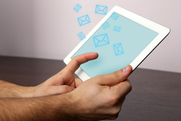 Email concept with tablet and hands