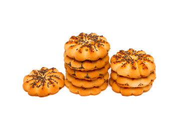 Round sugar cookies with poppy seeds on a white background.