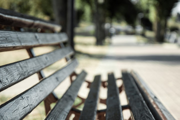 Fototapeta premium Blurred background park bench