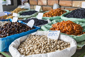 Dry fruits and spices like cashews, raisins, cloves, anise, etc.