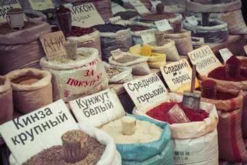 Beautiful vivid oriental market with bags full of various spices
