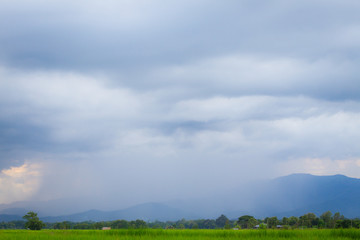 Fototapeta na wymiar Bad weather landscape of countryside with rain on mountain 