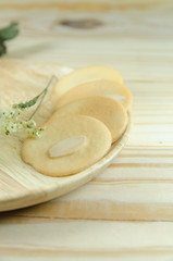 almond cookie on wooden table