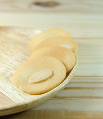 almond cookie on wooden table