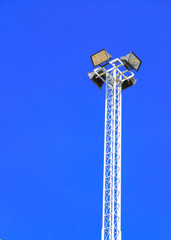 Fototapeta premium Sportlight on blue-sky background
