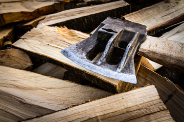 Axe on pile of firewood. Background for your project