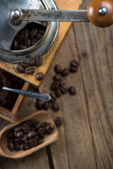 Vintage coffee grinder and beans