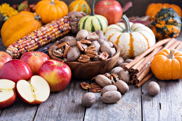 Pumpkins, nuts, indian corn and apples