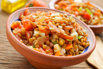 lentil salad on a rustic wooden table