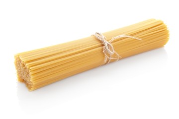 Long spaghetti raw isolated on white background