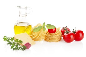 Studio shot of tomatoes,pasta,basil and cheese on white