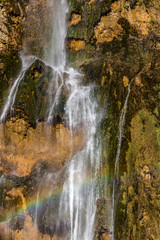 Fototapeta na wymiar Waterfall with rainbow in national park Plitvice, Croatia
