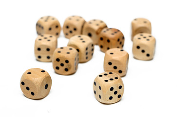 Wooden Dice on a White Background
