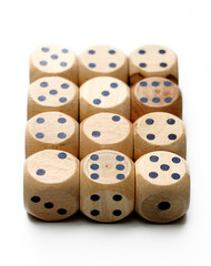 Wooden Dice on a White Background
