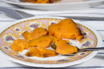 Eating roasted sweet potato