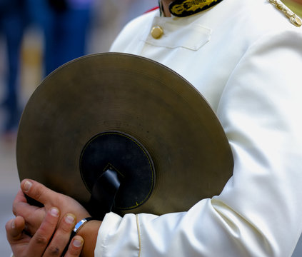musician with his cymbals during a break
