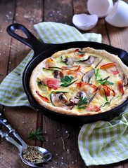 quiches with bacon, zucchini and mushrooms
