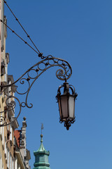 Fototapeta na wymiar Forged street lamp