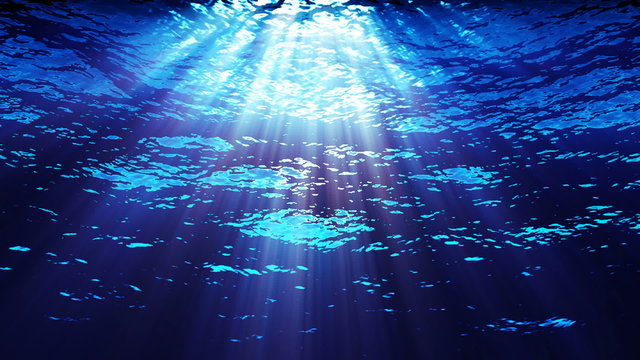 Water FX0212: Underwater light filters down through blue water (Loop).