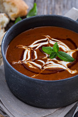Spicy tomato cream soup with bread