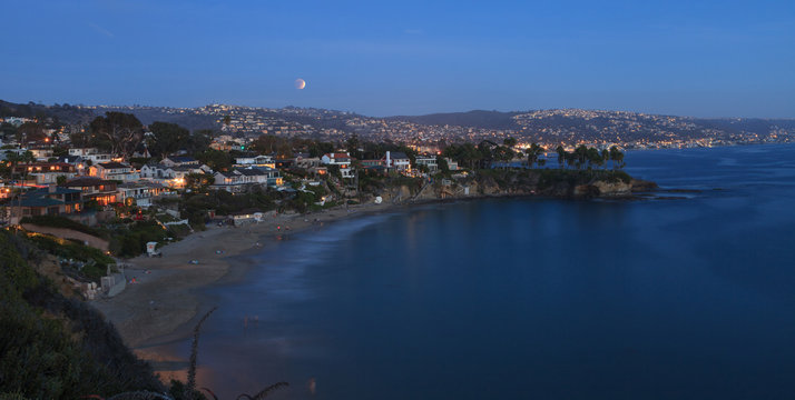 September 27, 2015. Laguna Beach, California Crescent Bay view of the blood moon. This full moon, also called a super moon and a harvest moon, is the result of a lunar eclipse. - Powered by Adobe