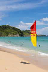 PHUKET, THAILAND-AUGUST 29, 2015 flag for telling tourists swim