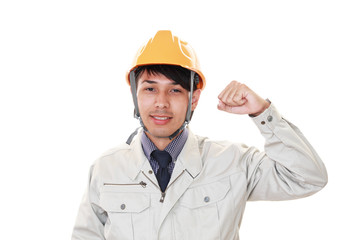 ガッツポーズの労働者