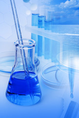 Laboratory equipment with blue liquid (water)